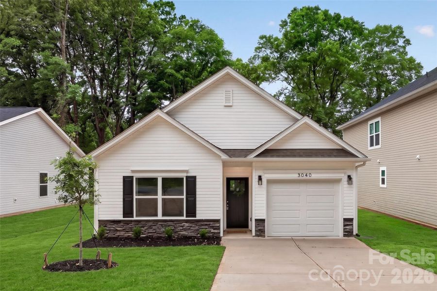 Front exterior of a new home in , Charlotte, NC, highlighting curb appeal (Image 2). Front exterior of a new home in , Charlotte, NC, highlighting curb appeal (Image 2).