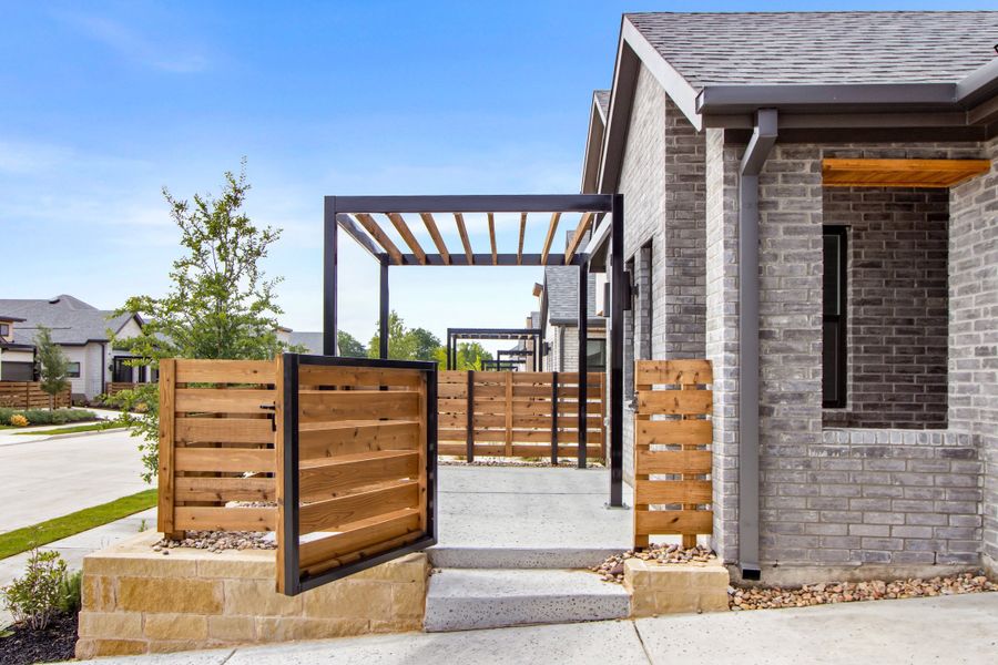 Exterior details and patio area of a home in Willow Grove Single-Family Homes, Melissa (Image 3). Exterior details and patio area of a home in Willow Grove Single-Family Homes, Melissa (Image 3).