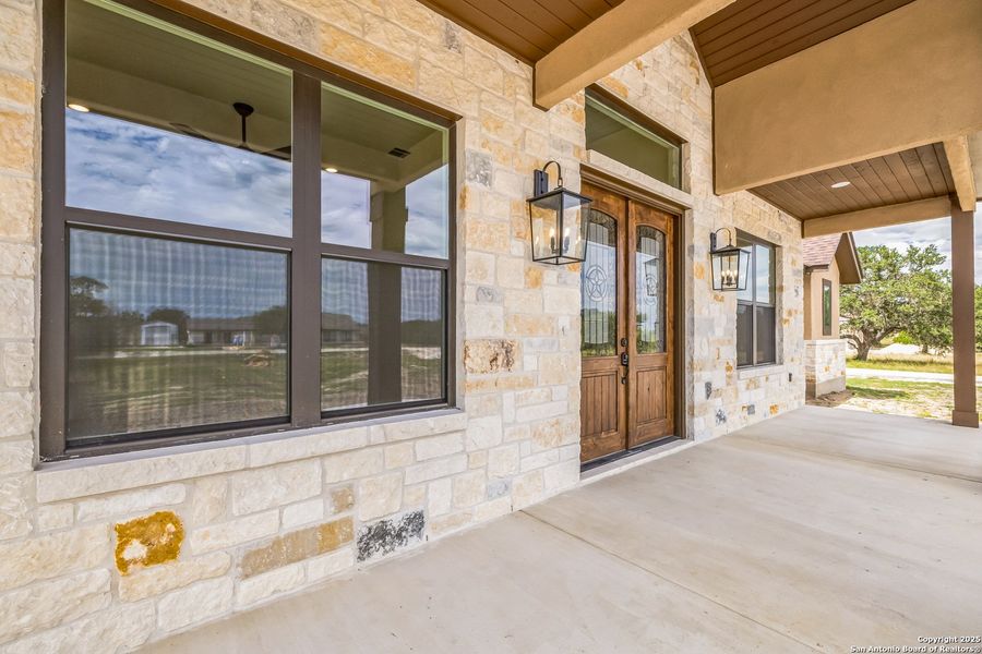 Exterior details and patio area of a home in , Bandera (Image 23).