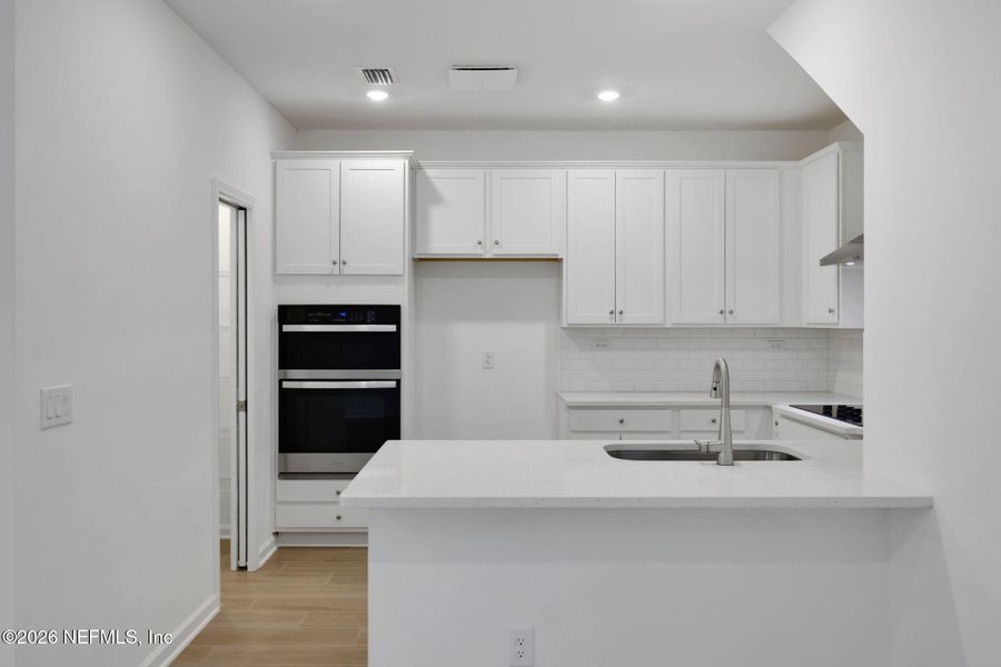 Furnished interior view inside a new home in The Hammock at Palm Harbor, Palm Coast (Image 6).