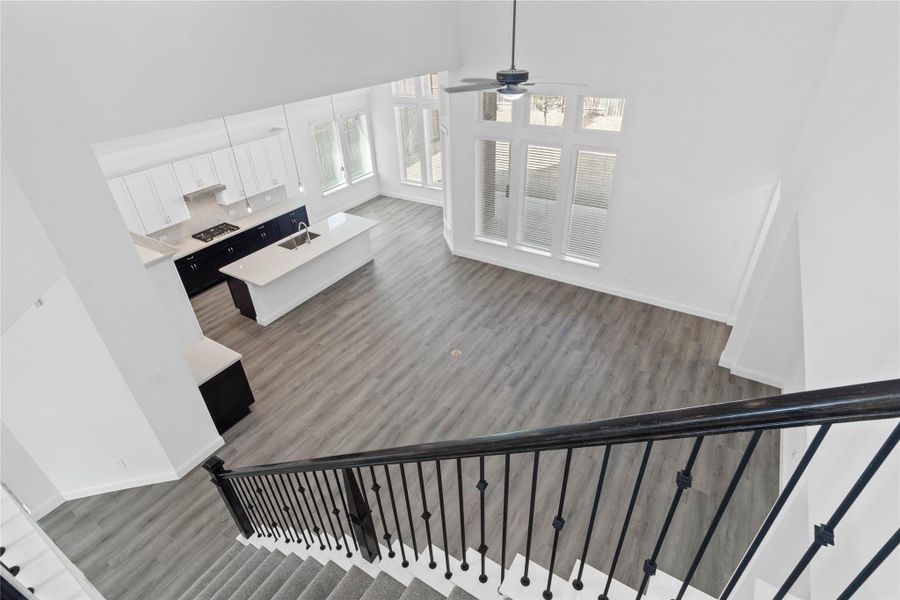 A phenomenal view from the second story, capturing the seamless flow between levels and an abundance of natural light. A phenomenal view from the second story, capturing the seamless flow between levels and an abundance of natural light.