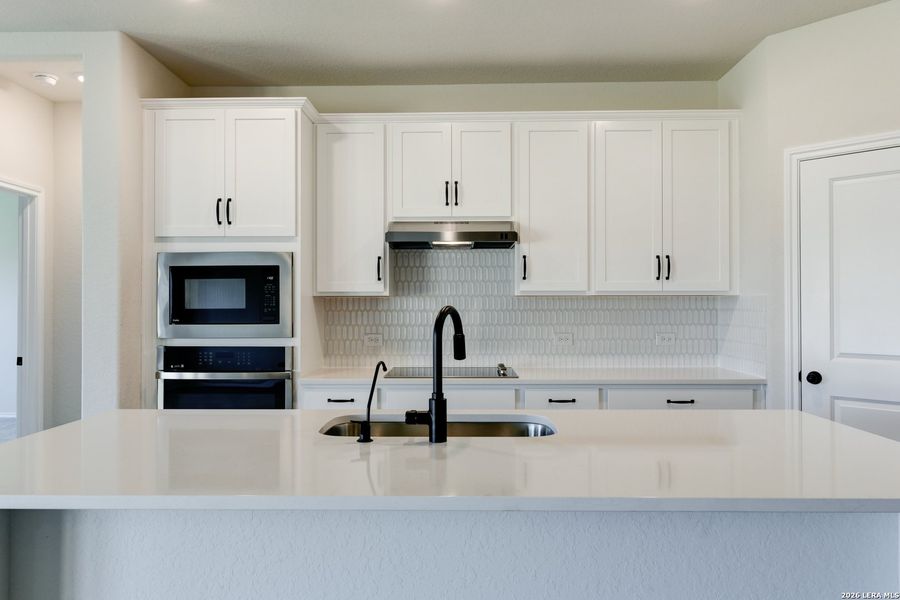 Furnished interior view inside a new home in Hennersby Hollow, San Antonio (Image 5).