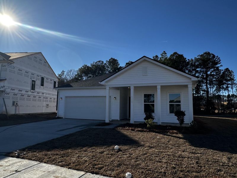 Front exterior of a new home in , Summerville, SC, highlighting curb appeal (Image 18).