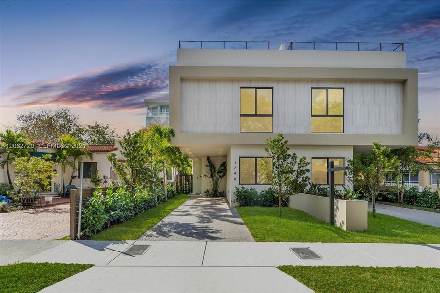 Front exterior of a new home in , Miami, FL, highlighting curb appeal (Image 23). Front exterior of a new home in , Miami, FL, highlighting curb appeal (Image 23).