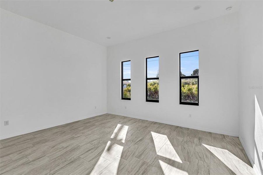 Spacious, unfurnished interior of a new home in , Port Charlotte (Image 9).