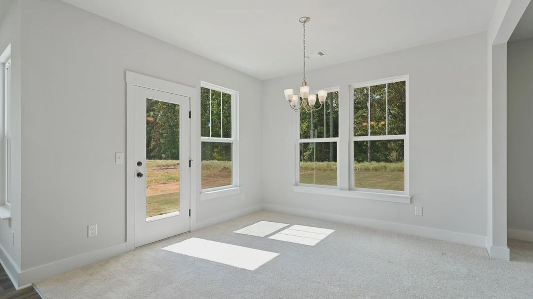 Representative furnished interior of a home built from the Stonefield - Finished Basement by DRB Homes in Pinebrook, Woodruff (Image 12).