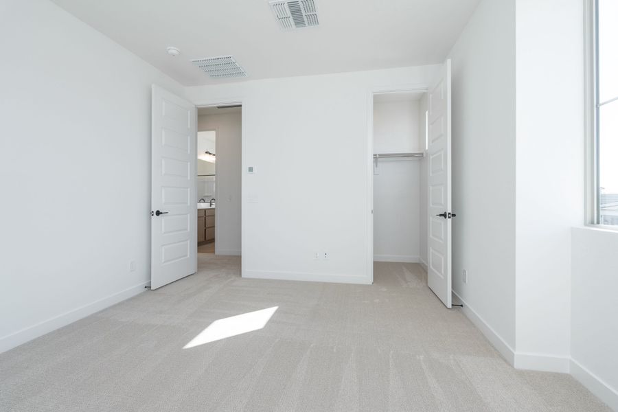 Spacious, unfurnished interior of a new home in Waterston Central, Gilbert (Image 16). Spacious, unfurnished interior of a new home in Waterston Central, Gilbert (Image 16).