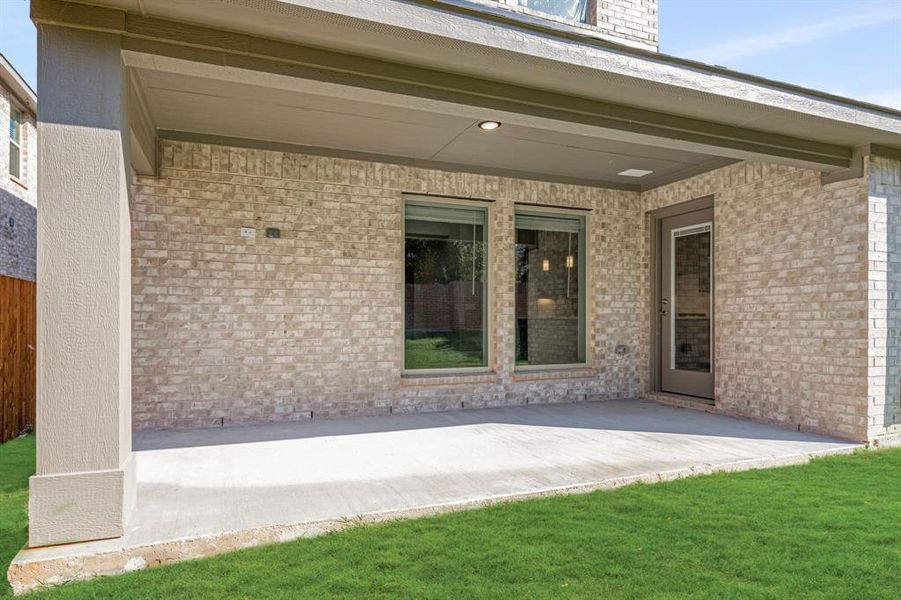 Exterior details and patio area of a home in The Enclave at Parks of Aledo, Aledo (Image 20). Exterior details and patio area of a home in The Enclave at Parks of Aledo, Aledo (Image 20).
