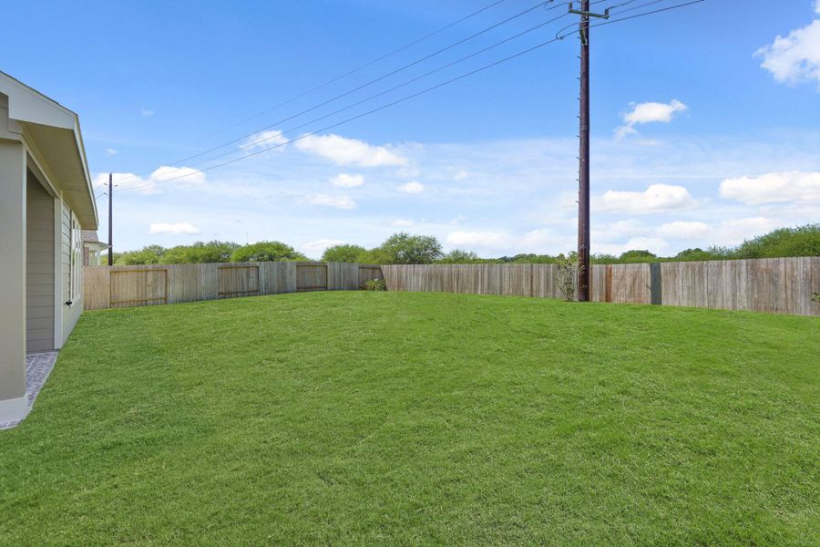 Front exterior of a new home in Briarwood Crossing, Rosenberg, TX, highlighting curb appeal (Image 2). Front exterior of a new home in Briarwood Crossing, Rosenberg, TX, highlighting curb appeal (Image 2).