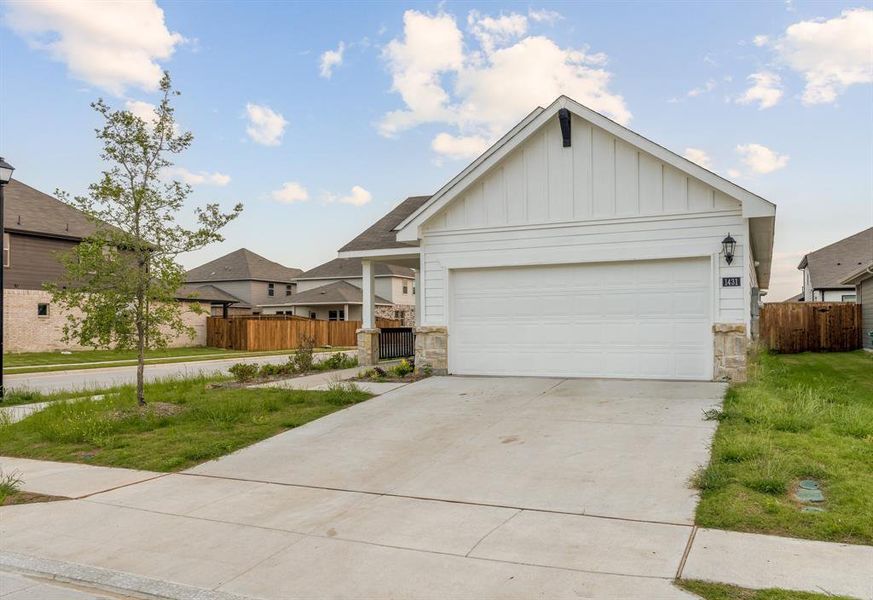 View of front of property with a garage