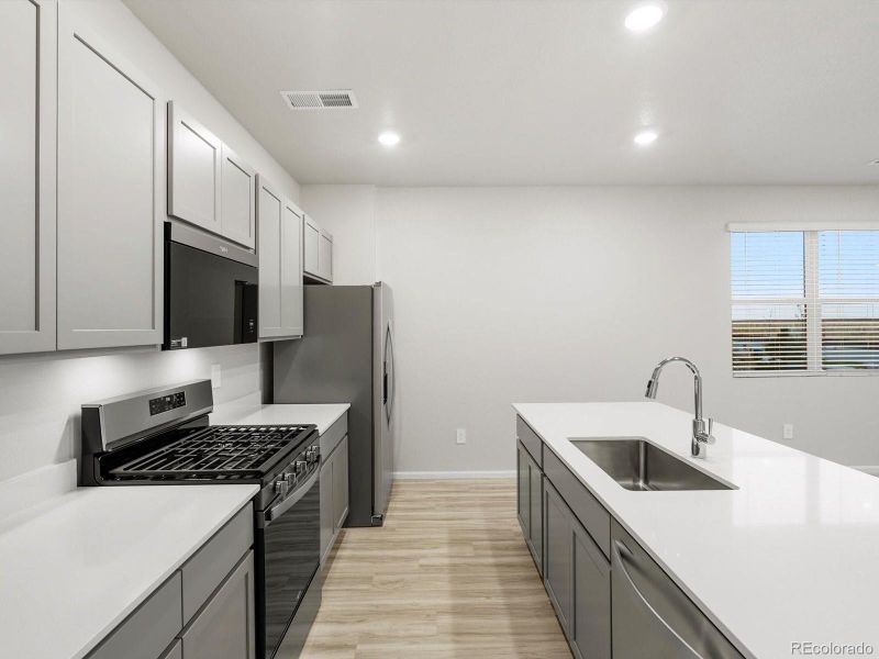 Furnished interior view inside a new home in , Aurora (Image 6).