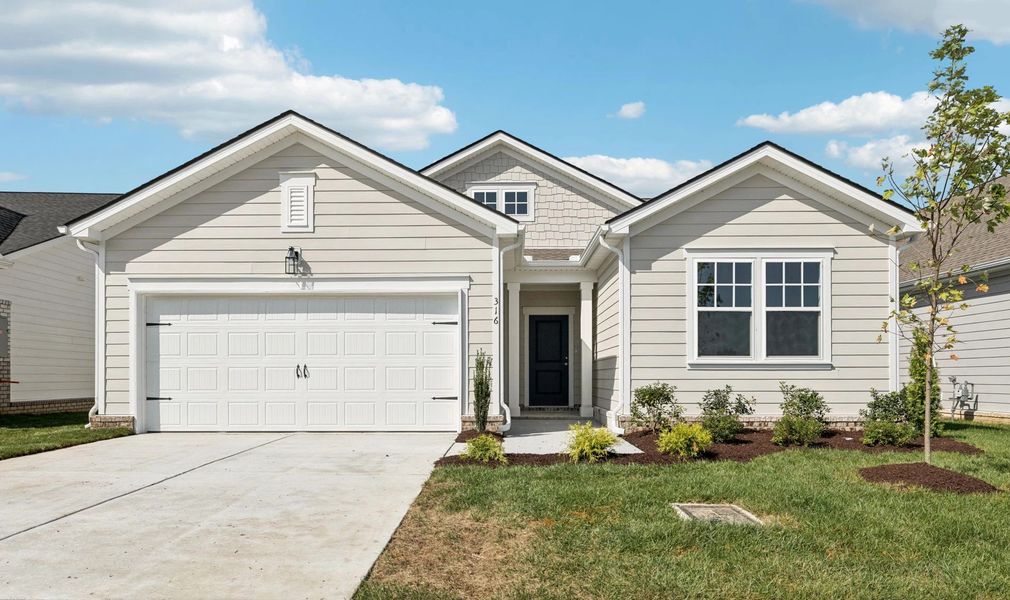 Front exterior of a new home in Cedars at Cane Ridge | 55+ Community, Antioch, TN, highlighting curb appeal (Image 1).