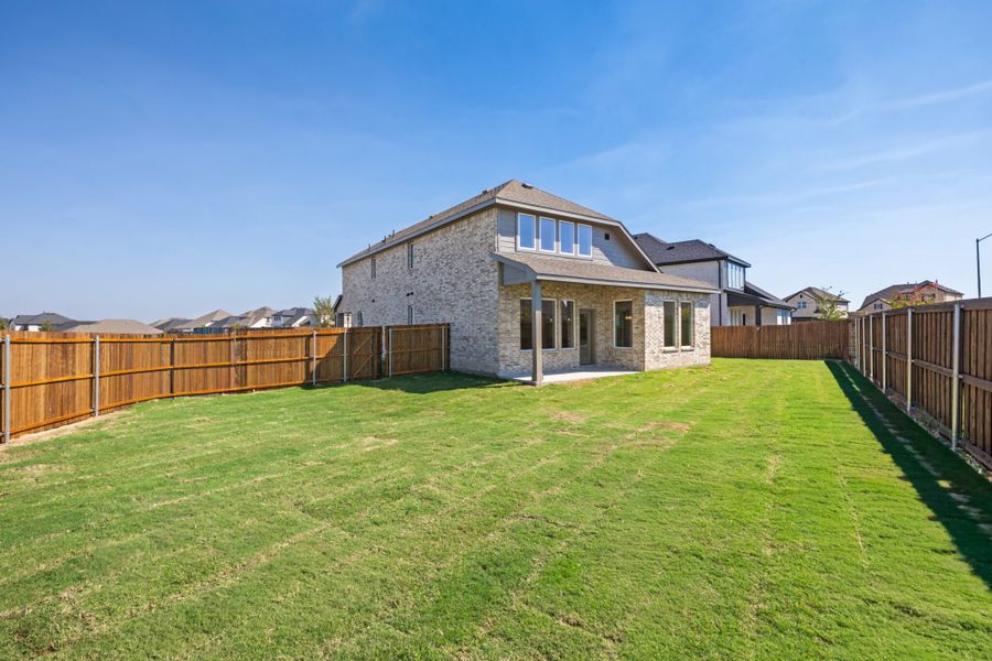 Exterior details and patio area of a home in Elevon, Lavon (Image 20).