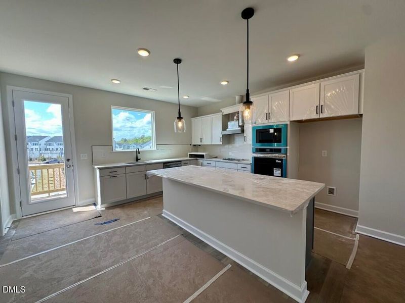 In-progress construction of a new home in Forestville Yard Townhomes, Knightdale, NC (Image 8).