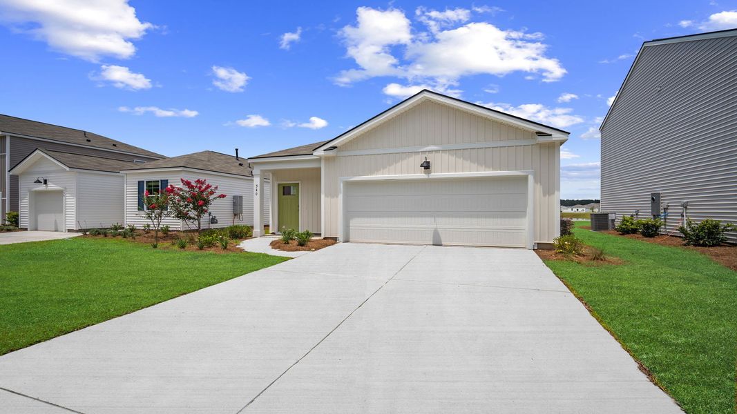 Front exterior of a new home in The Retreat at East Argent, Ridgeland, SC, highlighting curb appeal (Image 2). Front exterior of a new home in The Retreat at East Argent, Ridgeland, SC, highlighting curb appeal (Image 2).