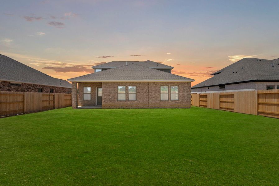 Exterior details and patio area of a home in Windcress, Cove (Image 26).