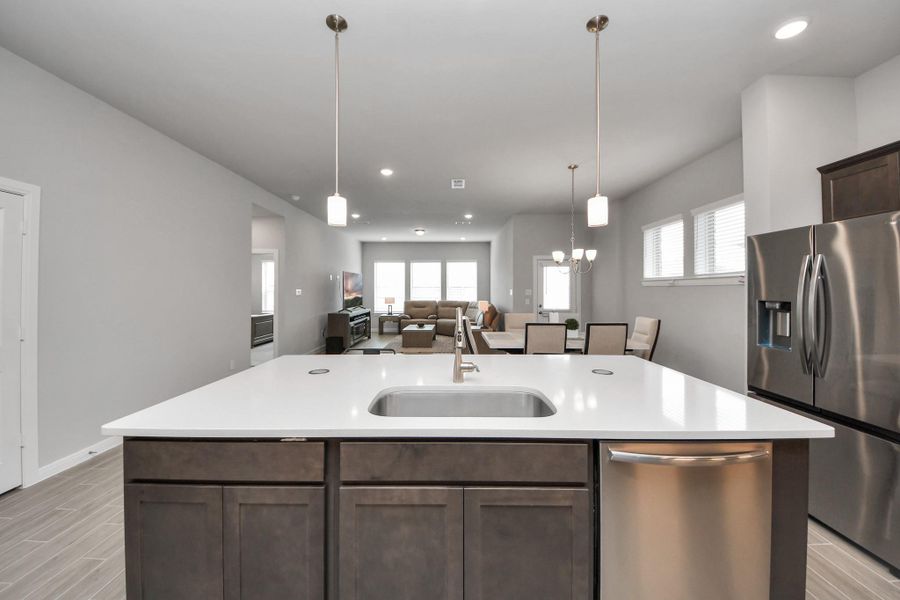 Open Kitchen to enjoy daily living! Electrical outlet upgrades throughout the home and pop-up charge stations on the kitchen island!