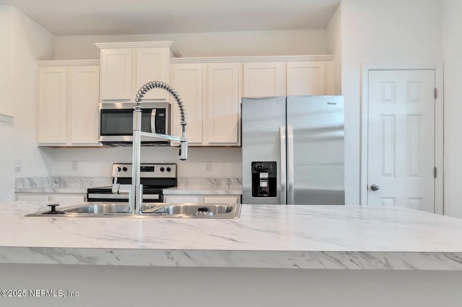 Furnished interior view inside a new home in , Jacksonville (Image 8). Furnished interior view inside a new home in , Jacksonville (Image 8).