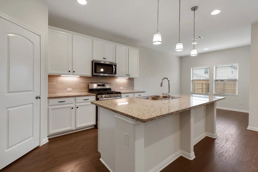 Representative furnished interior of a home built from the Cambridge by Ashton Woods in Lagos Reserve, Manor (Image 5). Representative furnished interior of a home built from the Cambridge by Ashton Woods in Lagos Reserve, Manor (Image 5).