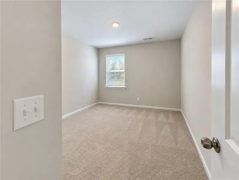 Spacious, unfurnished interior of a new home in Kingsmere Estates, Loganville (Image 23).