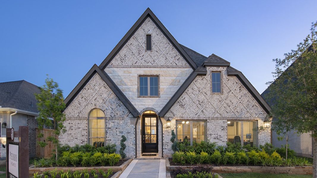 Front exterior of a new home in Meadows of Mill Creek, Seguin, TX, highlighting curb appeal (Image 26).