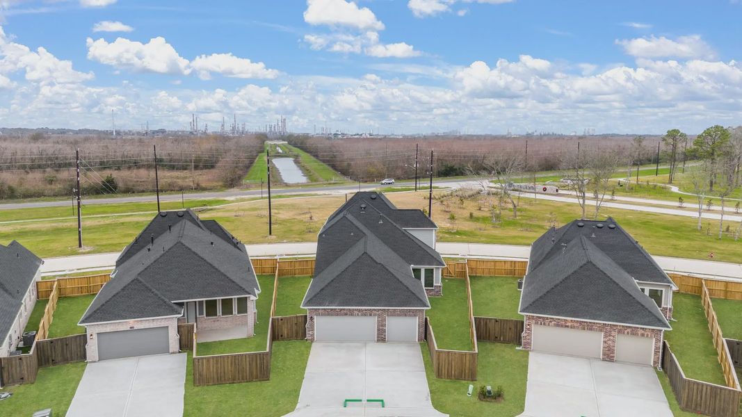 Representative exterior photo of a completed home built from the Sorenstam by Chesmar Homes in Riceland Alley Loads, Mont Belvieu, TX (Image 31).