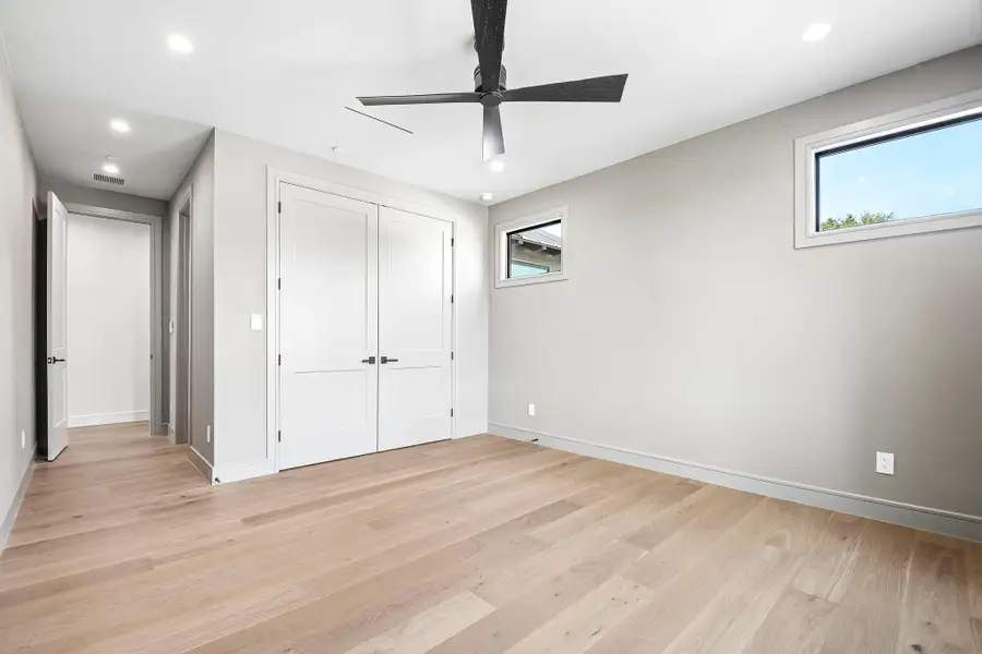 Spacious, unfurnished interior of a new home in The Overlook at Westlake, Austin (Image 38).