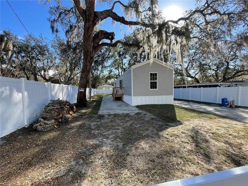 Exterior details and patio area of a home in , New Port Richey (Image 16).