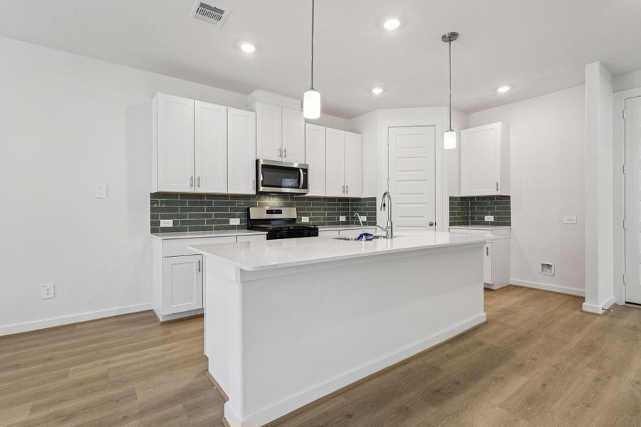 Photo is not of the actual home, but is an inspirational photo of builder’s model home and may depict options, furnishings, and/or decorator features that are not included