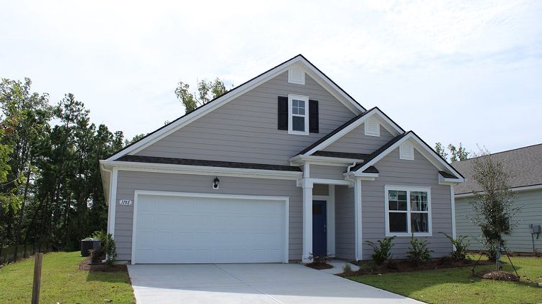 Representative exterior photo of a completed home built from the Dover by D.R. Horton in Hemingway Landing, Conway, SC (Image 12). Representative exterior photo of a completed home built from the Dover by D.R. Horton in Hemingway Landing, Conway, SC (Image 12).