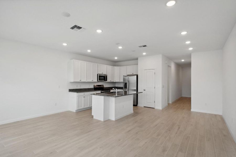 Kitchen, Great Room and Dining Area Kitchen, Great Room and Dining Area