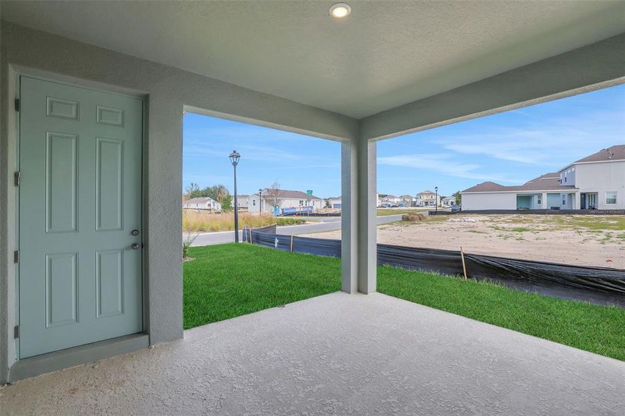 Exterior details and patio area of a home in Crossroads at Kelly Park, Apopka (Image 22).