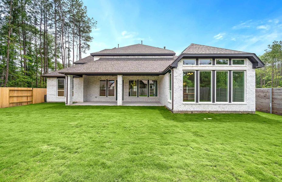 Representative exterior details of a home built from the 4094 by Ravenna Homes in Artavia 70′, Conroe (Image 29).