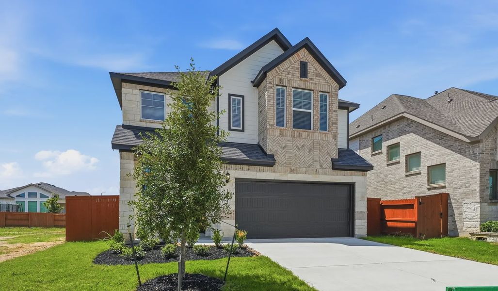 Front exterior of a new home in Stillwater Ranch, San Antonio, TX, highlighting curb appeal (Image 20).