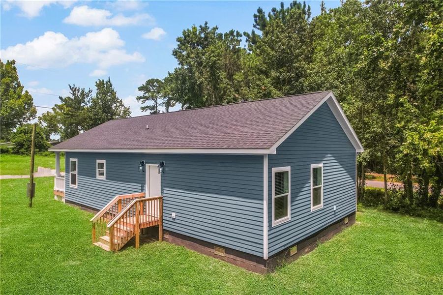 Front exterior of a new home in , Ludowici, GA, highlighting curb appeal (Image 2). Front exterior of a new home in , Ludowici, GA, highlighting curb appeal (Image 2).