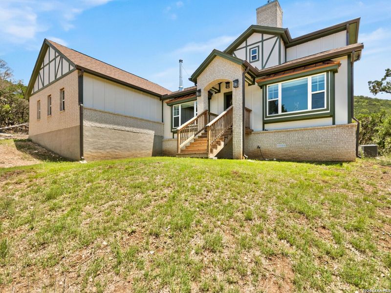 Exterior details and patio area of a home in , Bandera (Image 28).