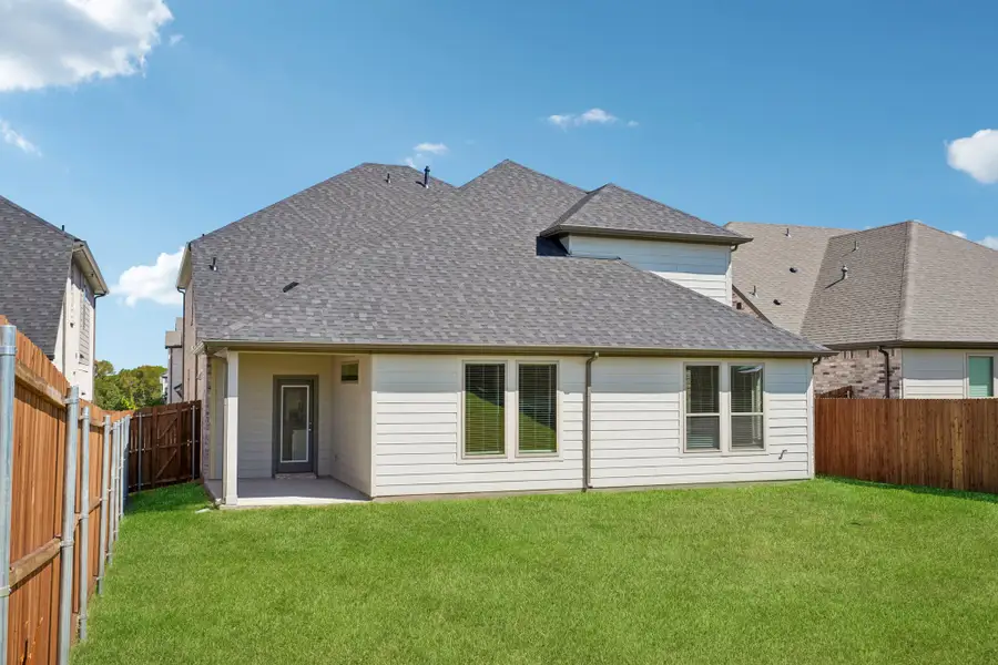 Covered Patio in the Wimbledon home plan by Trophy Signature Homes