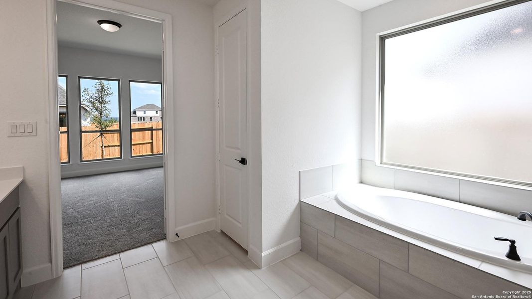 Furnished interior view inside a new home in Homestead 55', Cibolo (Image 12).