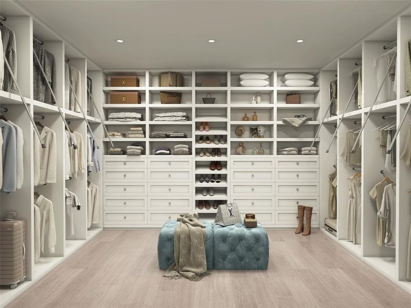 Monstrous walk in closet with top to bottom built-ins and hanging space for all of your fashion essentials!