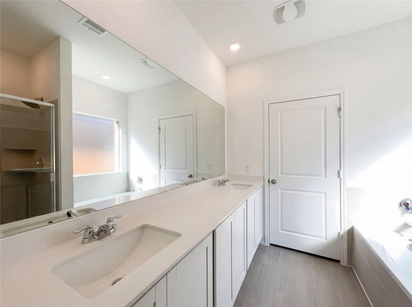 Furnished interior view inside a new home in The Colony, Bastrop (Image 10).