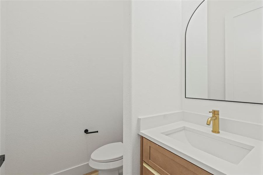 Bathroom with vanity and toilet