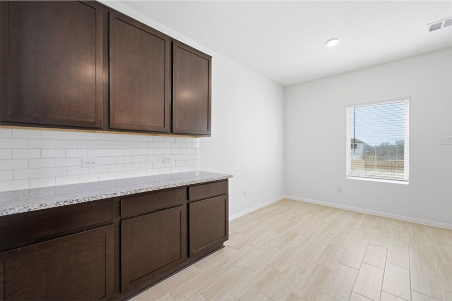 Furnished interior view inside a new home in Briarwood, Elgin (Image 11).