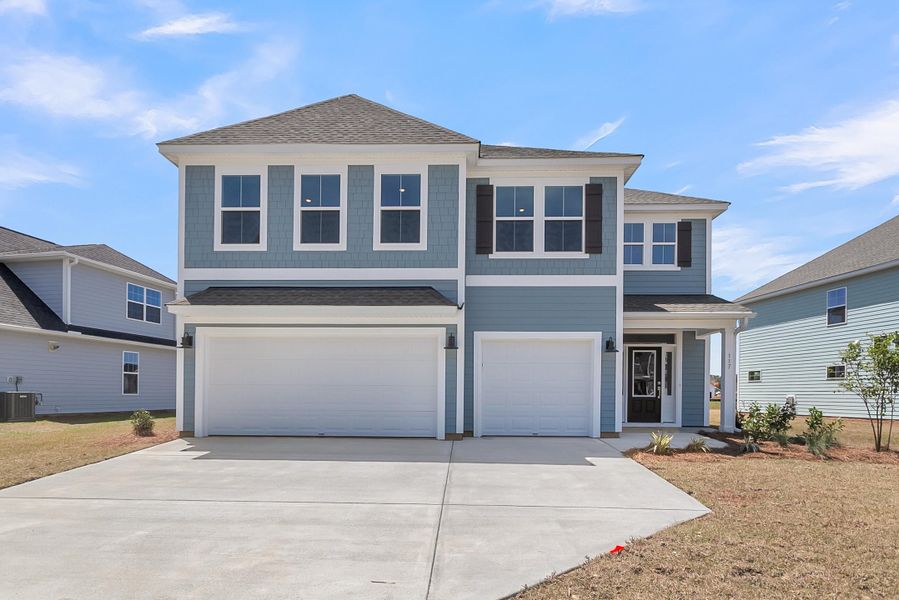 Front exterior of a new home in , Summerville, SC, highlighting curb appeal (Image 22).