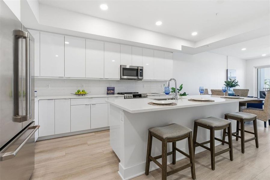 Furnished interior view inside a new home in Residences at Town Center, Madeira Beach (Image 34).