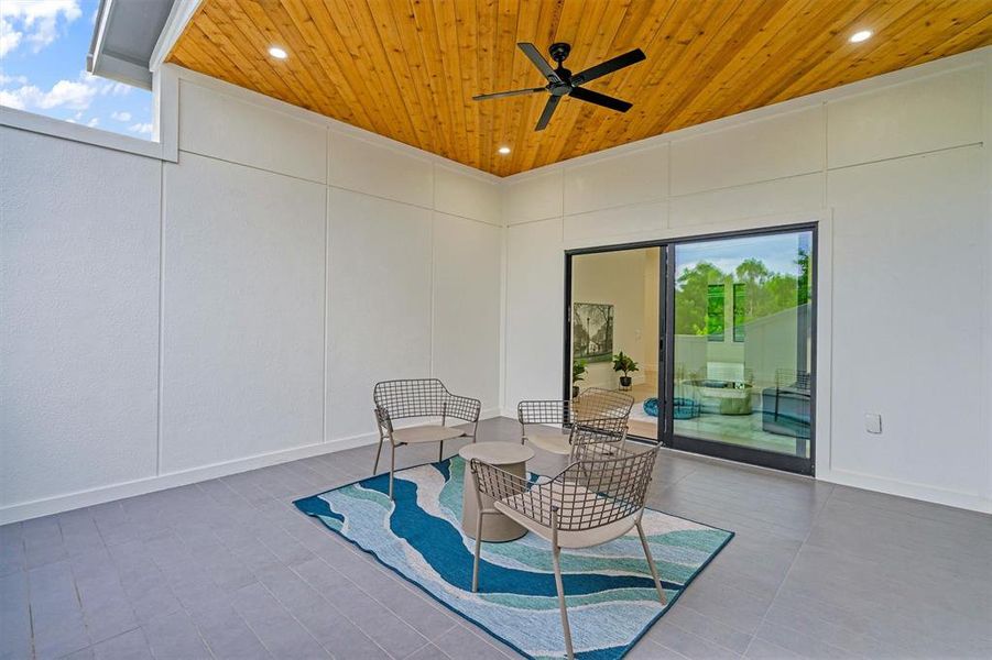 View of patio featuring ceiling fan