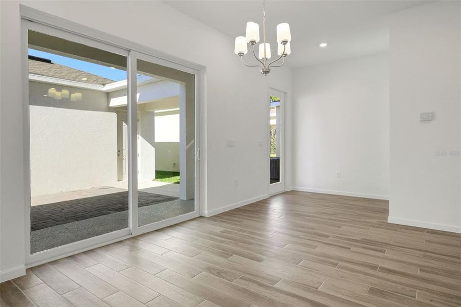 Spacious, unfurnished interior of a new home in Serenade at Ovation, Winter Garden (Image 29).