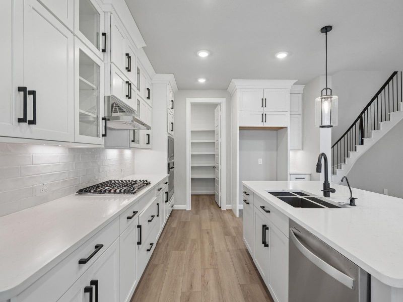 Furnished interior view inside a new home in Massey Oaks - Estate Series, Pearland (Image 14).