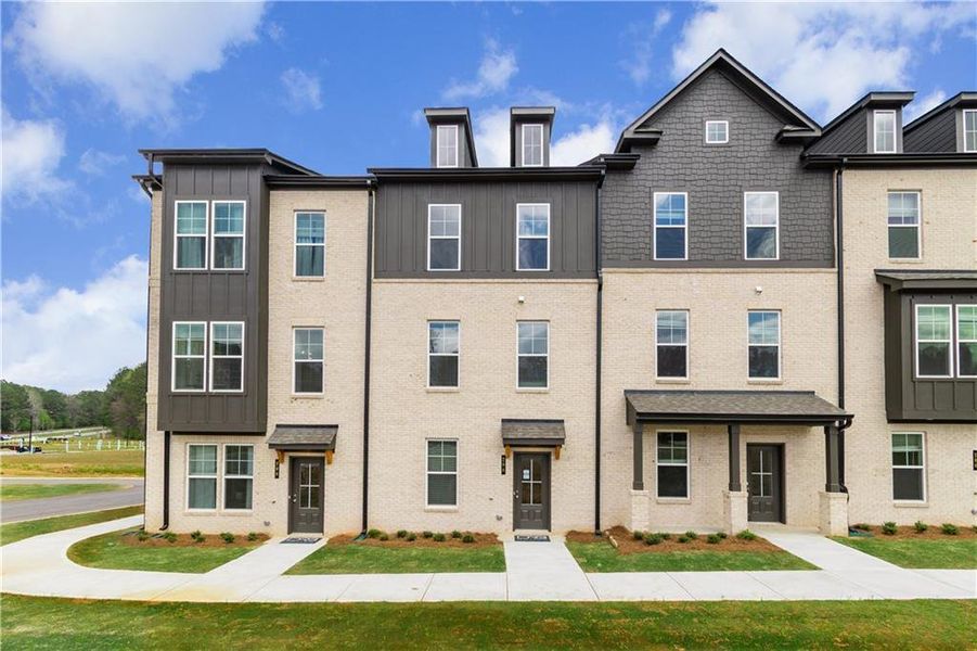 Front exterior of a new home in Daybreak, Newnan, GA, highlighting curb appeal (Image 15).