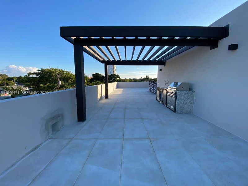 Exterior details and patio area of a home in , Miami (Image 11).