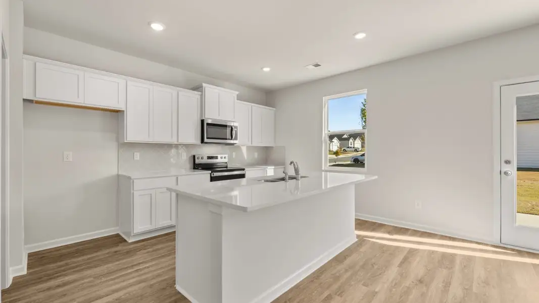 Representative furnished interior of a home built from the Galen by D.R. Horton in Fox Crossing, Griffin (Image 4).
